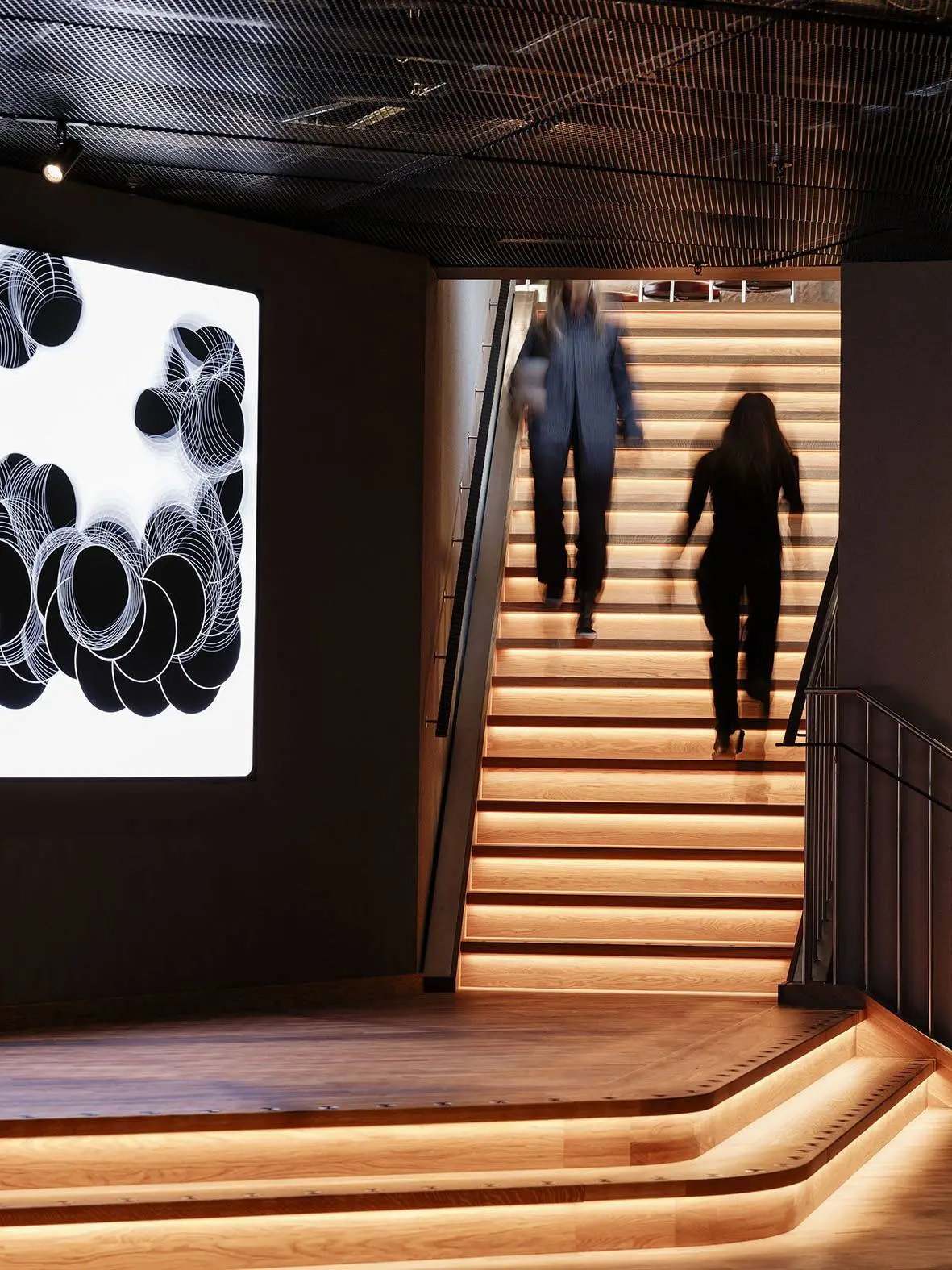 Custom-built modern staircase with integrated lighting designed by Klarhus in St. Louis