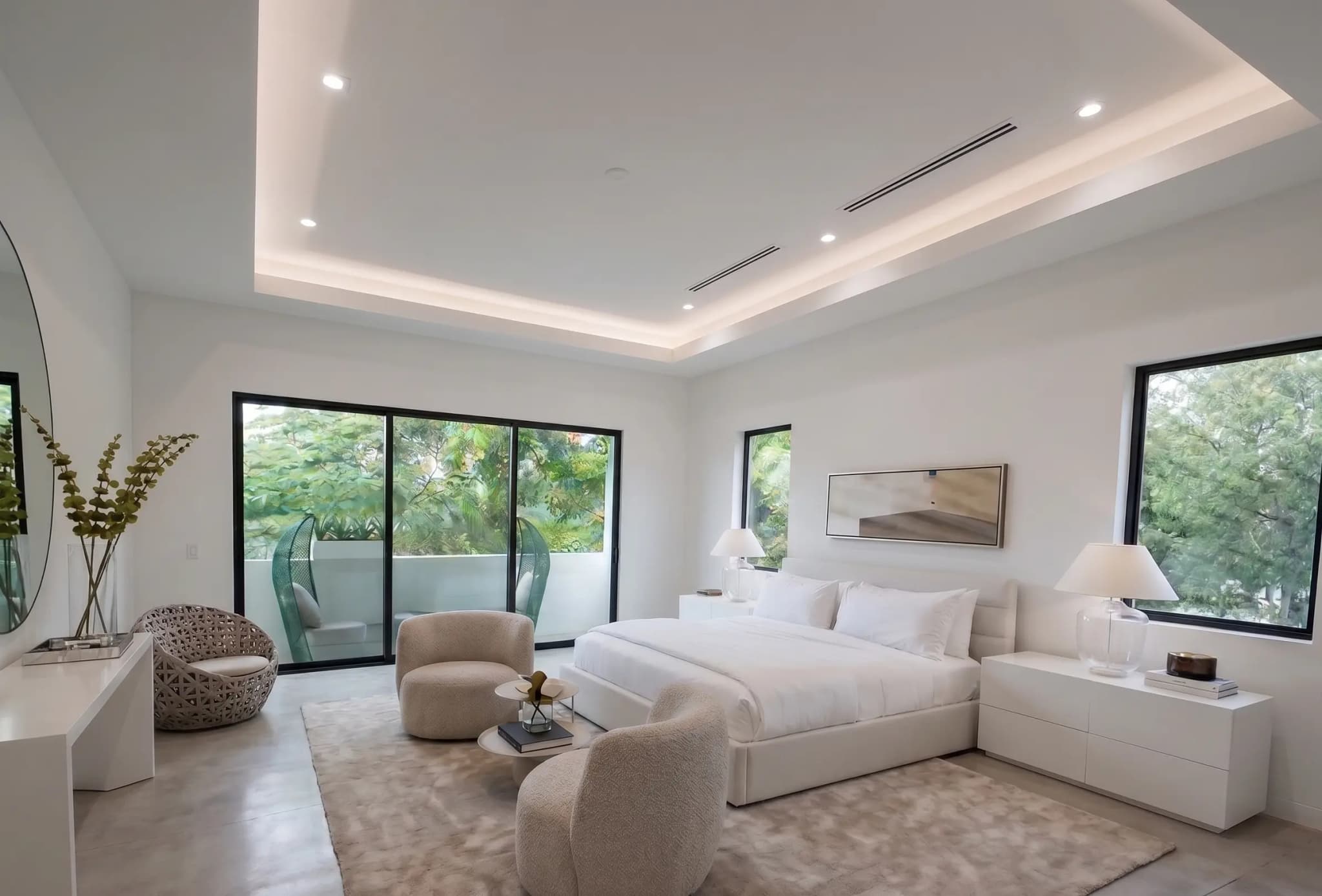 Primary bedroom interior at The Harrison with white oak millwork and natural light from south-facing windows